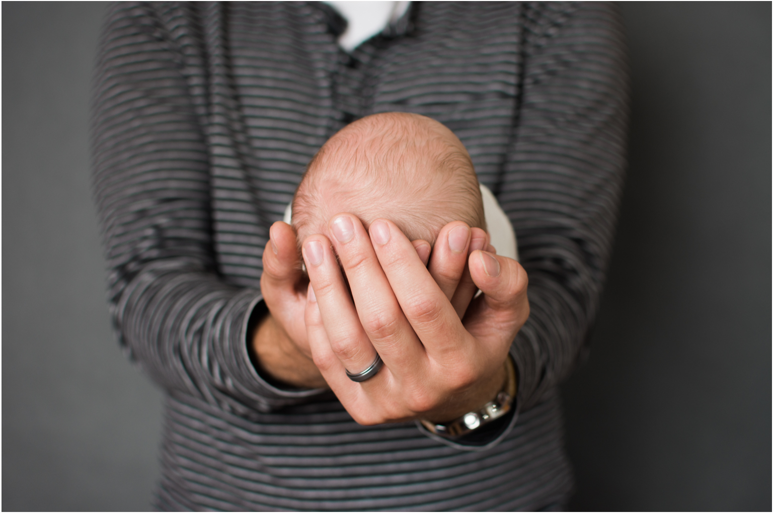 Emerson Brady newborn photos details family portrait daddys hands
